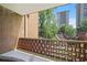 Balcony featuring brick facade and block railing with treetop views at 2637 Peachtree Ne Rd # 407, Atlanta, GA 30305