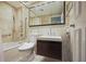 Accessible bathroom featuring a modern vanity and tiled shower/tub combo with grab bars at 2637 Peachtree Ne Rd # 407, Atlanta, GA 30305