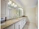 Large bathroom with double sinks, granite counters, and plenty of storage at 2637 Peachtree Ne Rd # 407, Atlanta, GA 30305