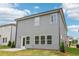 Back exterior featuring a well-maintained yard and gray siding at 2762 Aralynn Way, College Park, GA 30337