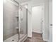 Modern bathroom with tile shower and glass door at 2762 Aralynn Way, College Park, GA 30337