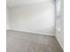 Bright bedroom with neutral carpet, crisp white walls, and a window at 2762 Aralynn Way, College Park, GA 30337