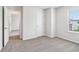 Comfortable bedroom with plush carpeting and a view of an adjacent room at 2762 Aralynn Way, College Park, GA 30337