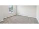 Cozy bedroom with neutral carpeting and natural light from the window at 2762 Aralynn Way, College Park, GA 30337