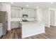 Bright kitchen featuring stainless steel appliances, an island, and modern finishes at 2762 Aralynn Way, College Park, GA 30337