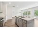 Bright kitchen with large center island, stainless appliances and modern finishes at 2762 Aralynn Way, College Park, GA 30337