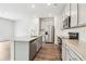 Modern kitchen featuring stainless steel appliances and a spacious island at 2762 Aralynn Way, College Park, GA 30337