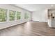Spacious living room featuring hardwood floors, bright windows, and an open layout at 2762 Aralynn Way, College Park, GA 30337