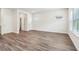Spacious open living room with windows, creating a welcoming and versatile space at 2762 Aralynn Way, College Park, GA 30337