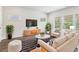 Bright living room with large windows, stylish furniture, and modern decor at 2762 Aralynn Way, College Park, GA 30337