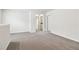 Expansive loft featuring neutral carpeting and multiple doorways leading to other rooms at 2762 Aralynn Way, College Park, GA 30337
