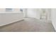 Large, carpeted loft area with ample natural light and views of surrounding rooms at 2762 Aralynn Way, College Park, GA 30337