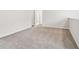 Spacious loft area with neutral carpeting, offering flexible living space at 2762 Aralynn Way, College Park, GA 30337
