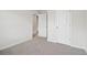 Bedroom with neutral carpet and closet space at 2764 Aralynn Way, College Park, GA 30337