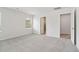 Large bedroom with light gray carpet and multiple entryways at 2764 Aralynn Way, College Park, GA 30337