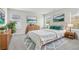 Sunlit bedroom featuring stylish furnishings, light gray carpet, and tasteful wall art at 2764 Aralynn Way, College Park, GA 30337