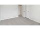 This bedroom features neutral carpet and closet space at 2764 Aralynn Way, College Park, GA 30337