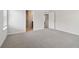 Neutral bedroom with light gray carpet and entryways to other rooms at 2764 Aralynn Way, College Park, GA 30337