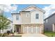 Charming two-story home with mixed siding and a two-car garage at 2764 Aralynn Way, College Park, GA 30337