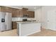 Modern kitchen with stainless appliances, granite counters, and a kitchen island for extra prep space at 2764 Aralynn Way, College Park, GA 30337