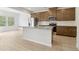 Bright kitchen with stainless appliances and a granite island, perfect for cooking and entertaining at 2764 Aralynn Way, College Park, GA 30337