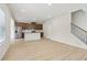 Open layout showcasing a kitchen with stainless steel appliances and center island at 2764 Aralynn Way, College Park, GA 30337