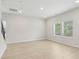 Spacious and bright living room with lots of natural light and wood-style flooring at 2764 Aralynn Way, College Park, GA 30337