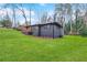 A picturesque house on a hill with a well-maintained lawn, offering a serene and private setting at 3661 W Potomac Dr, East Point, GA 30344