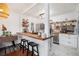 Modern kitchen with a breakfast bar, stainless steel appliances, and open shelving, ideal for cooking and dining at 105 Park Ridge Cir, Marietta, GA 30068