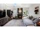 Stylish living room with a fireplace, unique decor, and hardwood floors, perfect for relaxing and entertaining at 105 Park Ridge Cir, Marietta, GA 30068