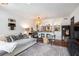 Open living room with a plush sofa, stylish decor, and hardwood floors, creating a welcoming atmosphere at 105 Park Ridge Cir, Marietta, GA 30068