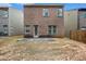 Exterior backyard view of a brick two-story home at 3095 Bonnes Dr, Lithonia, GA 30038