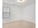 Empty bedroom with a window allowing natural light over neutral carpet at 3095 Bonnes Dr, Lithonia, GA 30038