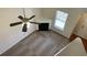 High-angle view of the living room, showcasing the fireplace and ceiling fan at 3108 Broadleaf Trl, Fairburn, GA 30213