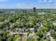 Aerial view of home in lush, green neighborhood near the city, offering a serene yet convenient location at 2585 Acorn Ne Ave, Atlanta, GA 30305