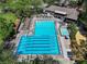 Aerial view of a stunning pool area with lap lanes, recreational swimming area, and a large pool house at 2585 Acorn Ne Ave, Atlanta, GA 30305