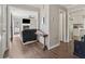 Welcoming entryway features hardwood floors, neutral paint, and a glimpse into the living room at 3362 Timber Rdg, Powder Springs, GA 30127