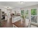 Eat-in kitchen features stainless appliances, dark countertops, and views to the rear deck at 3362 Timber Rdg, Powder Springs, GA 30127
