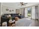 Comfortable living room with large sectional sofa, natural light, and stylish decor at 3362 Timber Rdg, Powder Springs, GA 30127
