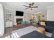 Cozy living room showcasing a fireplace, built-in shelving, and ample seating at 3362 Timber Rdg, Powder Springs, GA 30127
