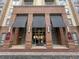 The building's entrance showcases classic architecture, prominent signage, and easy sidewalk access at 711 Cosmopolitan Ne Dr # 347, Atlanta, GA 30324