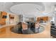 Luxurious clubhouse featuring a large bar, hardwood floors, and lounge seating at 711 Cosmopolitan Ne Dr # 347, Atlanta, GA 30324