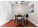 Small dining area with hardwood floors and a view into other areas of the condo at 711 Cosmopolitan Ne Dr # 347, Atlanta, GA 30324