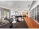 Open lounge area featuring a piano, ample seating, bar and floor-to-ceiling windows at 711 Cosmopolitan Ne Dr # 347, Atlanta, GA 30324
