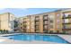 Relaxing pool with modern buildings in the background at 711 Cosmopolitan Ne Dr # 347, Atlanta, GA 30324