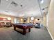 Expansive recreation room with a pool table, seating areas, and ample lighting for entertainment at 711 Cosmopolitan Ne Dr # 347, Atlanta, GA 30324