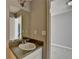 Bathroom featuring sink, vanity, faucet, mirror, and grey walls at 90 Ashford Dr, Oxford, GA 30054