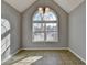 Bright breakfast nook with a large arched window offering natural light at 90 Ashford Dr, Oxford, GA 30054