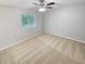 Cozy bedroom with neutral carpet, ample natural light, and a ceiling fan at 245 Adena W Ln, Atlanta, GA 30349