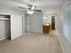Spacious main bedroom with ensuite bathroom, generous closet space, and natural light at 245 Adena W Ln, Atlanta, GA 30349
